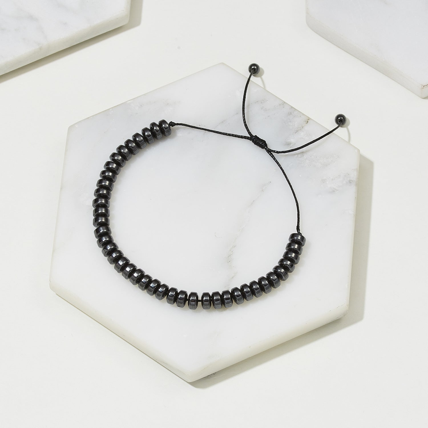 Wholesale Love flat bead black gallstone hand-woven adjustable bracelet